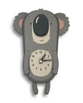 Handcrafted wall clock shaped like a cute koala, unique animal décor, neutral background.